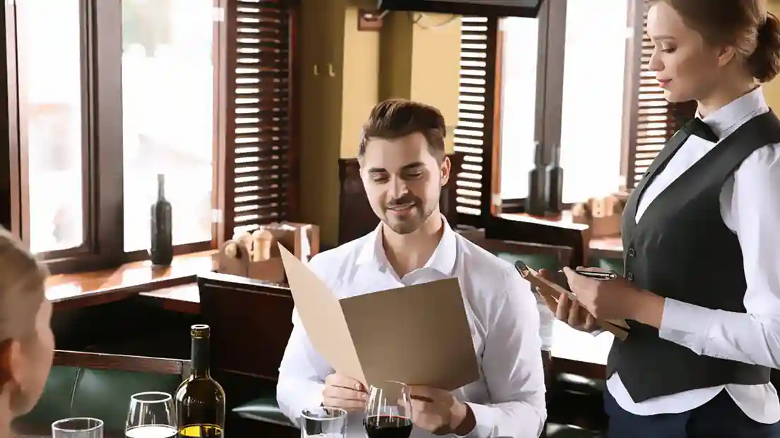 Ordering food and drinks, and paying the bill in a German restaurant